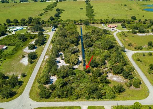 Property at 392 Carrillon Ave S, Lehigh Acres, FL 33974