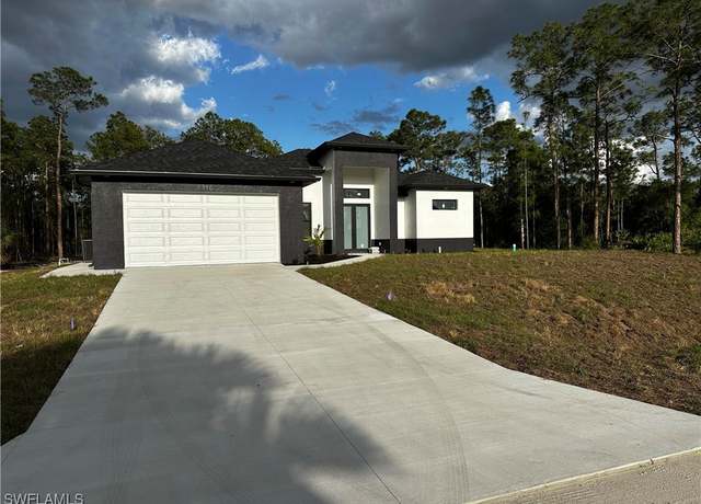 Property at 1310 Acacia Ave, Lehigh Acres, FL 33972, 3 beds, 2 baths