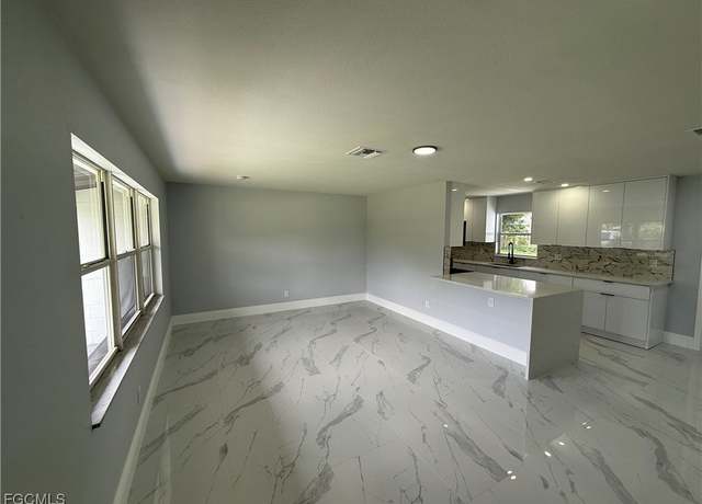 Property at 305 Penn Rd W, Lehigh Acres, FL 33936, 3 beds, 2 baths
