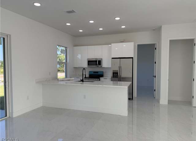 Property at 1017 Rush Ave, Lehigh Acres, FL 33972, 3 beds, 2 baths