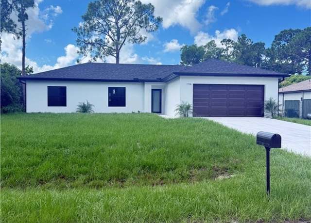 Property at 2705 10th St W, Lehigh Acres, FL 33971, 3 beds, 2 baths