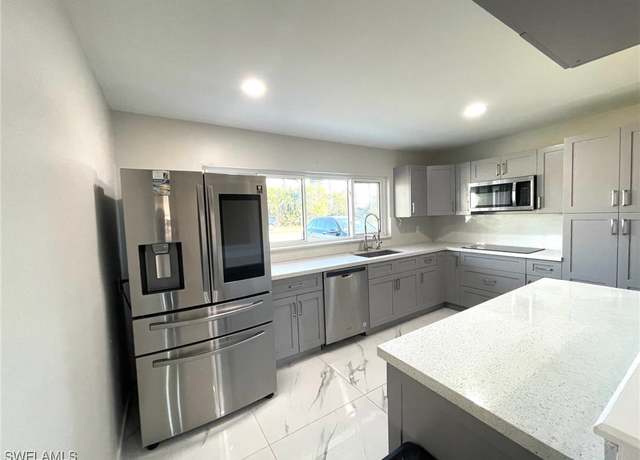 Property at 404 El Dorado Pkwy E, Cape Coral, FL 33904, 2 beds, 2 baths