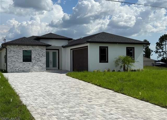 Property at 2619 15th St SW, Lehigh Acres, FL 33976, 3 beds, 2 baths