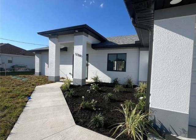 Property at 2518 33rd St SW, Lehigh Acres, FL 33976, 3 beds, 2 baths