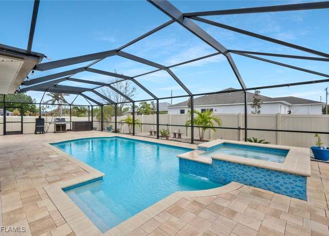 Property at 2703 NE 7th Ave, Cape Coral, FL 33909, 4 beds, 2 baths