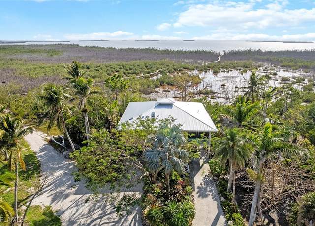 Property at 7377 Pineland Rd, Bokeelia, FL 33922, 4 beds, 3 baths