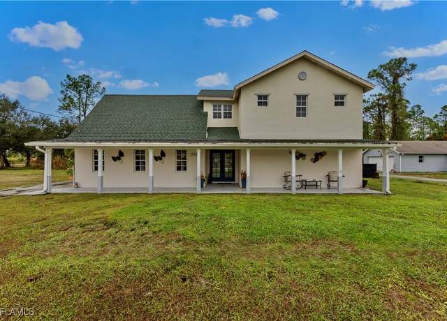 Property at 2011 Mill St, Lehigh Acres, FL 33972, 5 beds, 4.5 baths