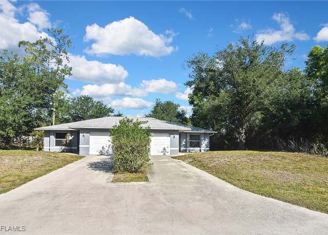 Property at 2420/2422 George Ave S, Lehigh Acres, FL 33973, 4 beds, 4 baths