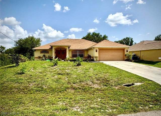 Property at 2611 65th St W, Lehigh Acres, FL 33971, 4 beds, 2 baths