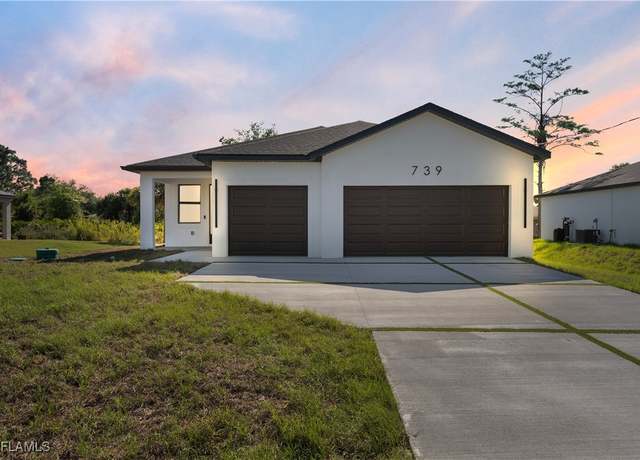 Property at 739 Woodcrest Dr, Lehigh Acres, FL 33972, 3 beds, 2 baths