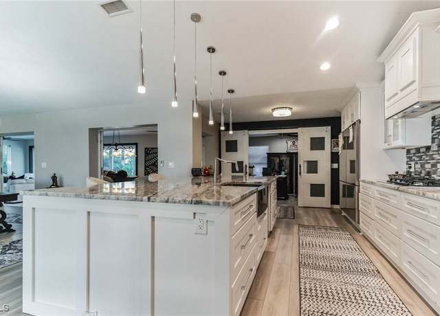 Property at 15141 Sam Snead Ln, North Fort Myers, FL 33917, 4 beds, 2 baths