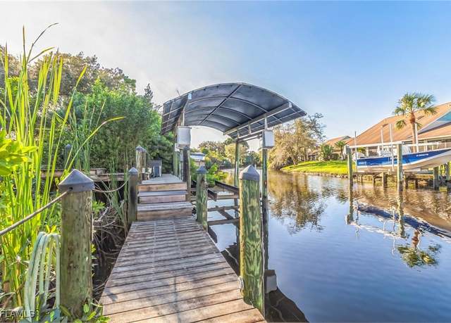 Property at 15141 Sam Snead Ln, North Fort Myers, FL 33917, 4 beds, 2 baths