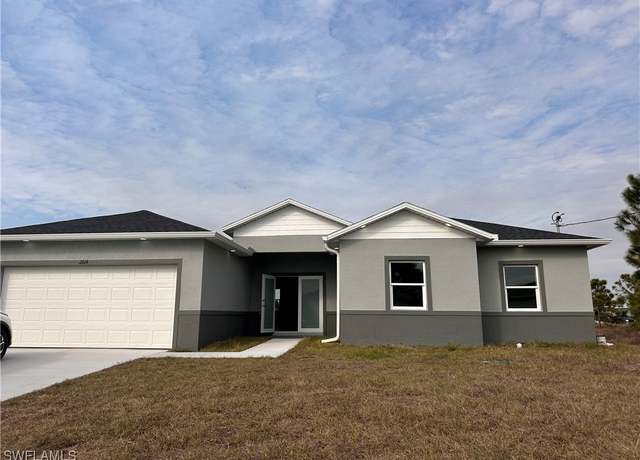 Property at 2509 38th St SW, Lehigh Acres, FL 33976, 4 beds, 2.5 baths