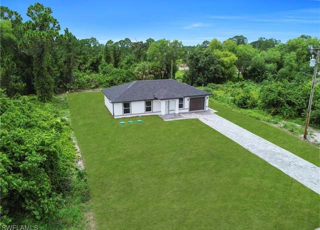 Property at 382 Mcarthur Blvd, Lehigh Acres, FL 33974, 3 beds, 2 baths
