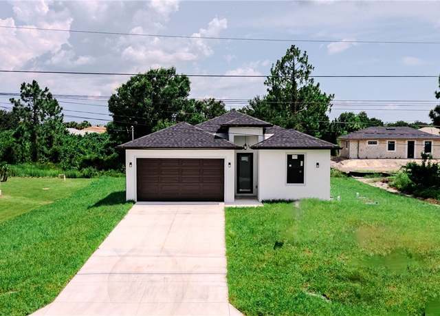 Property at 4107 13th St SW, Lehigh Acres, FL 33976, 3 beds, 2 baths