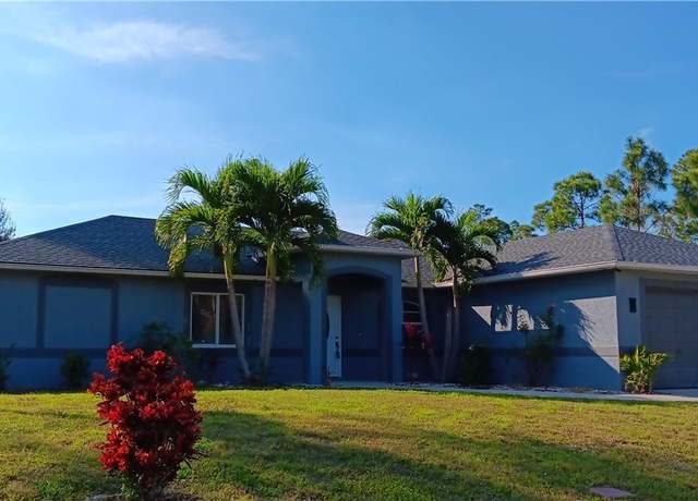 Property at 764 Chapman Ave S, Lehigh Acres, FL 33974, 4 beds, 2 baths