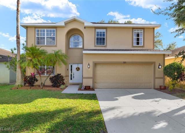 Property at 321 Shadow Lakes Dr, Lehigh Acres, FL 33974, 4 beds, 3 baths