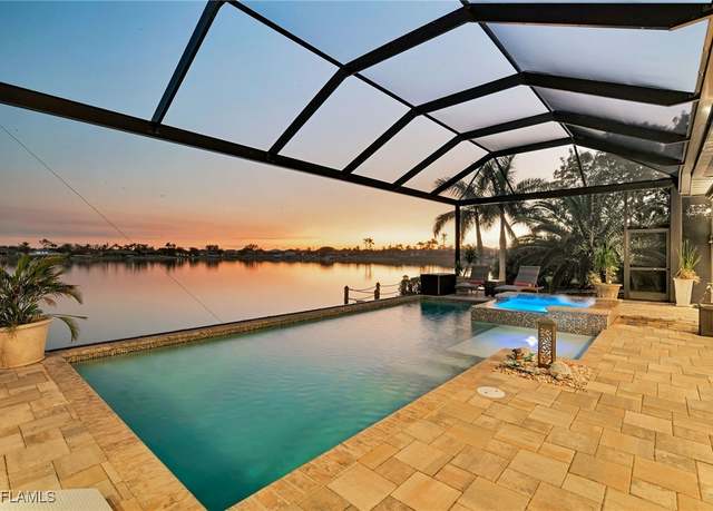 Property at 1310 SW 25th Ter, Cape Coral, FL 33914, 4 beds, 4.5 baths