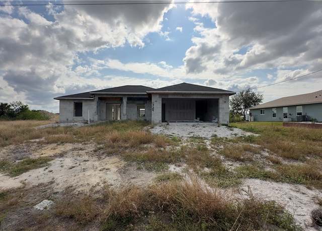 Property at 1724 NE 27th Ter, Cape Coral, FL 33909, 4 beds, 3 baths