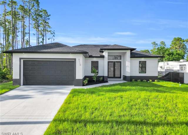 Property at 3110 21st St W, Lehigh Acres, FL 33971, 3 beds, 2 baths