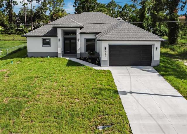 Property at 2929 20th St SW, Lehigh Acres, FL 33976, 4 beds, 2 baths
