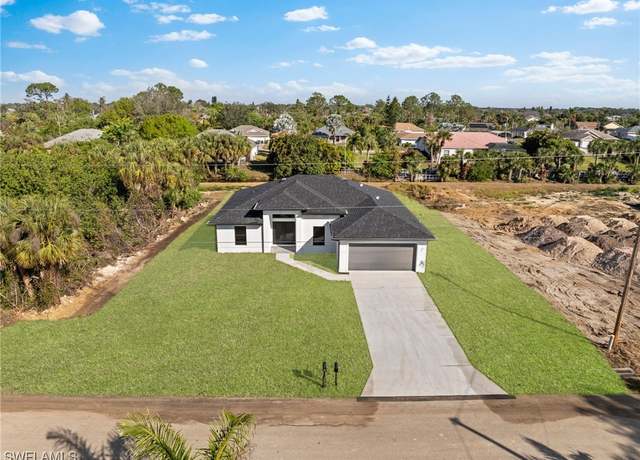 Property at 821 Porter St E, Lehigh Acres, FL 33974, 4 beds, 2 baths