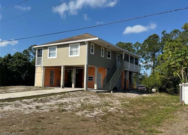 Property at 850 Bell Blvd S, Lehigh Acres, FL 33974, 2 beds, 2.5 baths