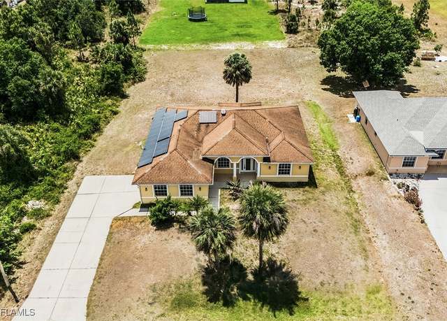 Property at 707 8th Ave, Lehigh Acres, FL 33972, 4 beds, 2 baths