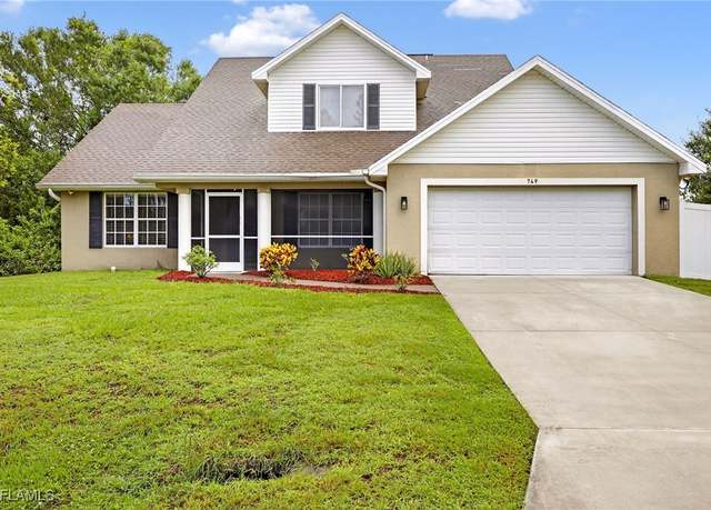 Property at 749 Chambers St E, Lehigh Acres, FL 33974, 3 beds, 2.5 baths