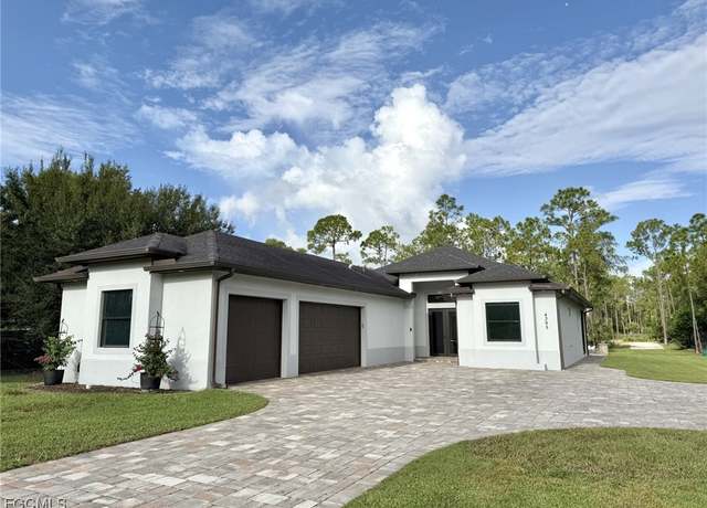 Property at 4395 16th St NE, Naples, FL 34120, 4 beds, 3 baths