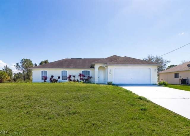 Property at 926 Plantation Rd, Lehigh Acres, FL 33974, 4 beds, 2 baths