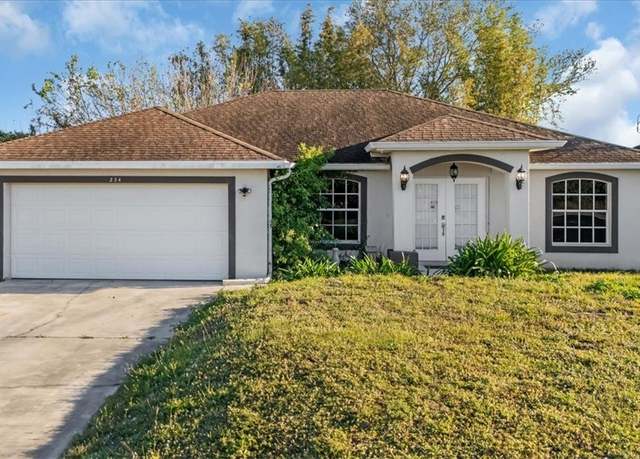 Property at 234 Pullman St, Lehigh Acres, FL 33974, 3 beds, 2 baths