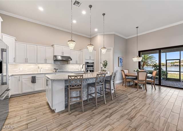 Property at 14429 Pine Hollow Dr, Estero, FL 33928, 5 beds, 4.5 baths