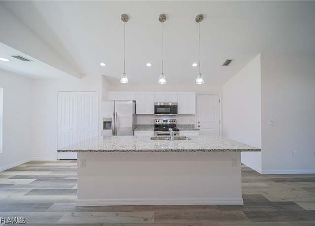 Property at 6013 Gene Ave N, Lehigh Acres, FL 33971, 3 beds, 2.5 baths
