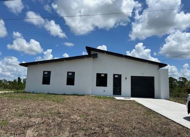 Property at 3107 Meadow Rd, Lehigh Acres, FL 33974, 3 beds, 3 baths