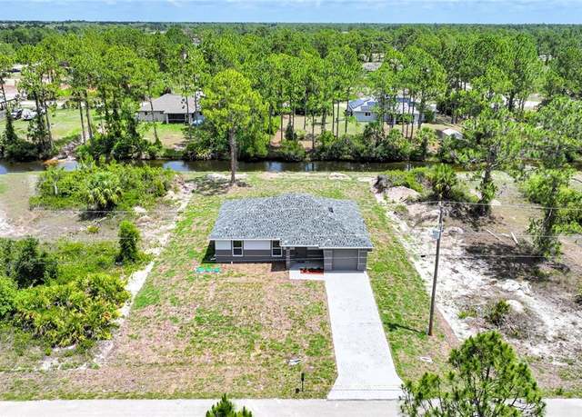 Property at 1043 Plantation Rd, Lehigh Acres, FL 33974, 3 beds, 2 baths