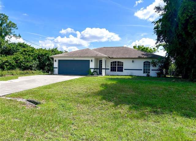 Property at 3003 32nd St SW, Lehigh Acres, FL 33976, 3 beds, 2 baths