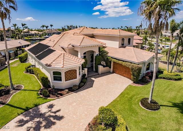 Property at 5502 Merlyn Ln, Cape Coral, FL 33914, 5 beds, 4.5 baths