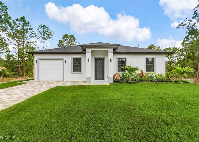 Property at 716 David Laird Ln, Lehigh Acres, FL 33974, 3 beds, 2 baths