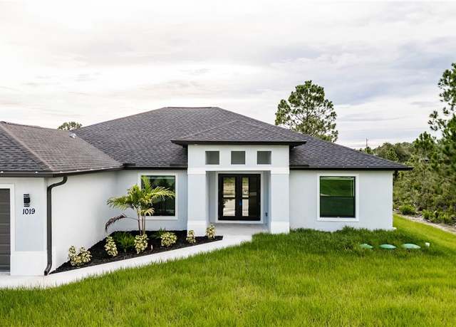 Property at 1019 Rush Ave, Lehigh Acres, FL 33972, 4 beds, 3 baths