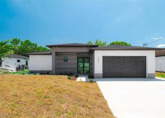 Property at 3203 18th St W, Lehigh Acres, FL 33971, 3 beds, 2.5 baths
