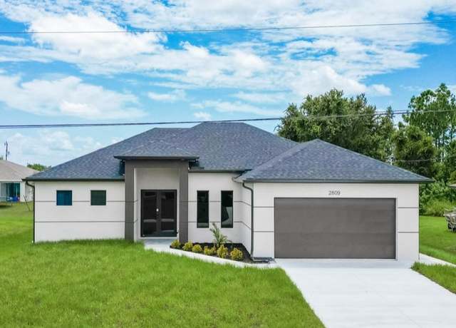 Property at 2809 25th St SW, Lehigh Acres, FL 33976, 3 beds, 2 baths