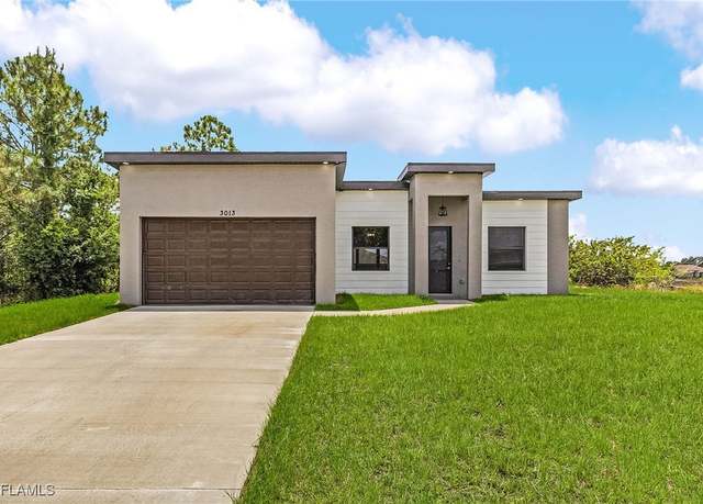 Property at 3013 4th St SW, Lehigh Acres, FL 33976, 3 beds, 2 baths