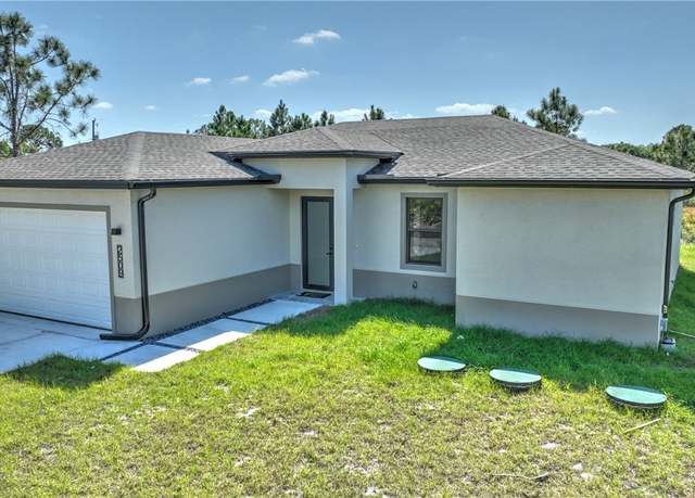 Property at 3306 74th St W, Lehigh Acres, FL 33971, 3 beds, 2 baths