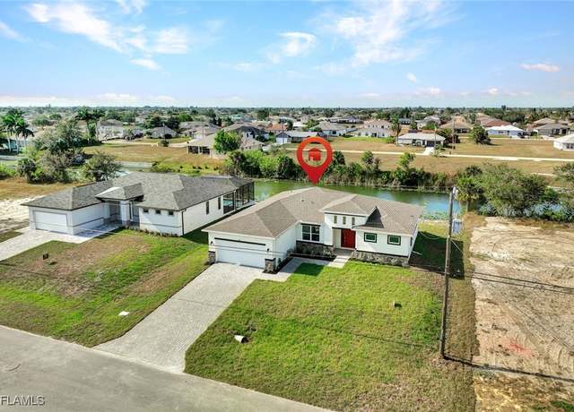 Property at 1414 NE 6th Ave, Cape Coral, FL 33909, 4 beds, 3 baths