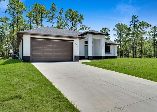Property at 300 W 11th St, Lehigh Acres, FL 33972, 3 beds, 2 baths