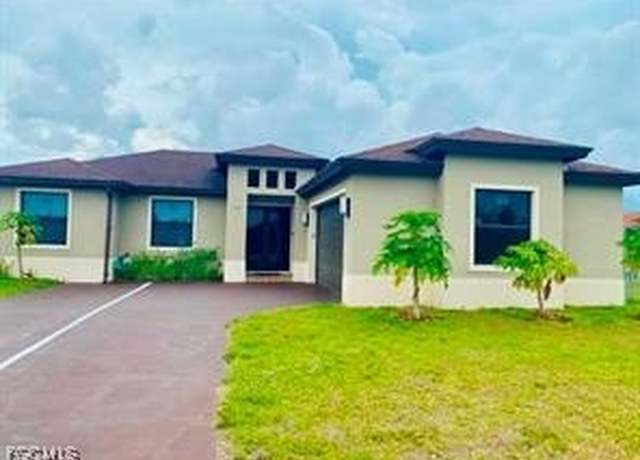Property at 906 Sunniland Blvd, Lehigh Acres, FL 33971, 3 beds, 2 baths