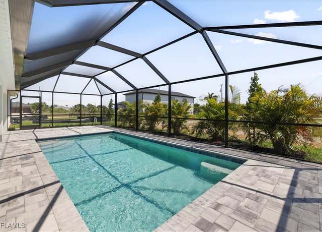 Property at 1021 NW 13th Ave, Cape Coral, FL 33993, 4 beds, 3 baths