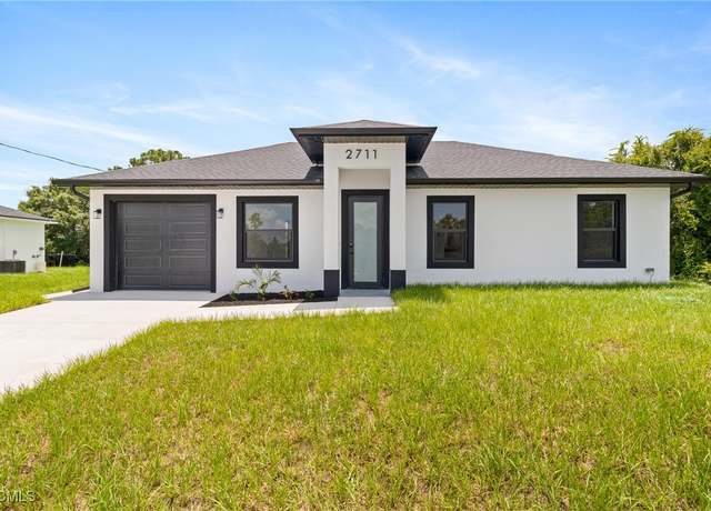 Property at 2711 50th St W, Lehigh Acres, FL 33971, 3 beds, 2 baths