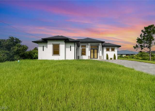 Property at 907 Sunniland Blvd, Lehigh Acres, FL 33971, 3 beds, 2 baths